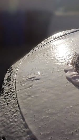 60-Second Tesla Wash: Foam, Finesse, and Futuristic Fun!